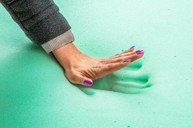 Hand Impression on a Memory Foam Bed.